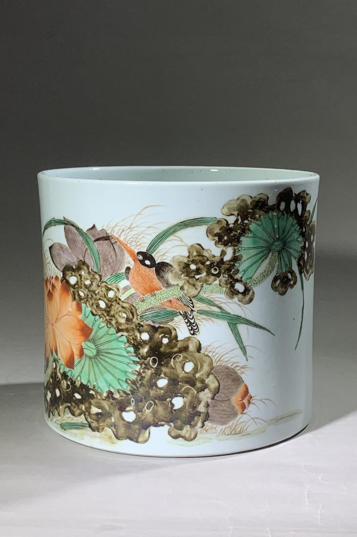 A WUCAI 'LOTUS AND INSECT' PORCELAIN BRUSH POT: A wucai 'lotus and insect' porcelain brush pot. Probably made in the Chinese Late Qing Dynasty Period. Dimensions: H 16.5 cm, Diam 18.3 cm. All measurements are approximate. Provenance: property of a 