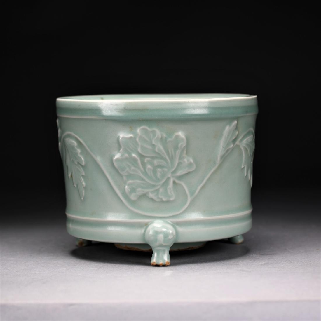 A Chinese Longquan Celadon Glazed Tripod Censor. (1 of 9)