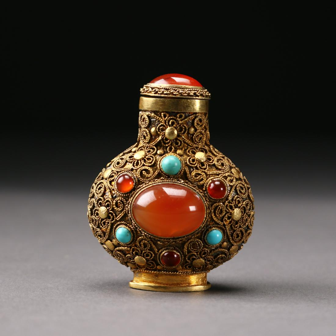 A Chinese Antique Gilt-Bronze Snuff Bottle (1 of 5)