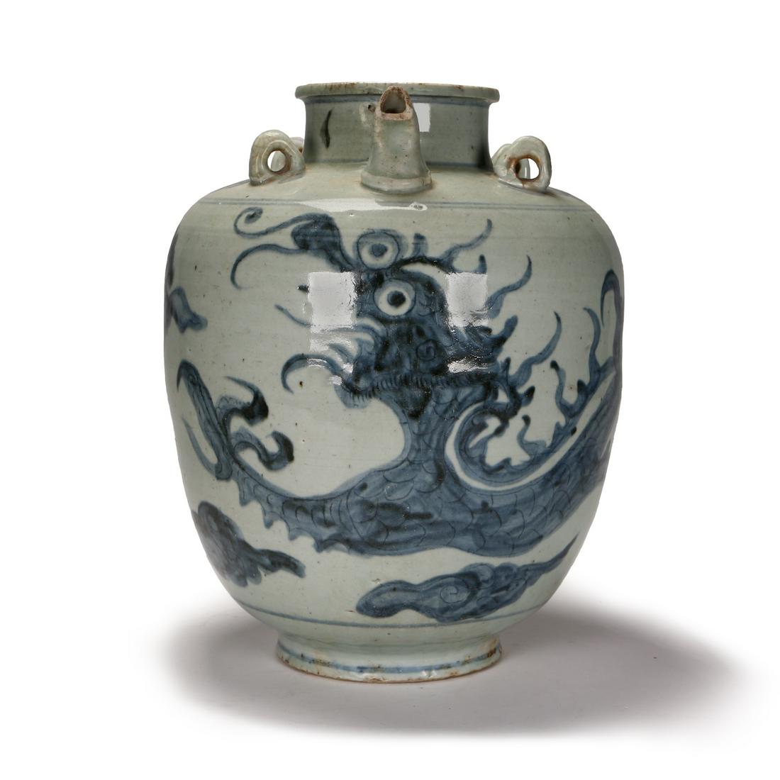 Ming Dynasty. Chinese Antique Blue and White Jar: Ming dynasty. A Chinese blue and white porcelain water jar painted dragon to the exterior. Height: 13 inches.