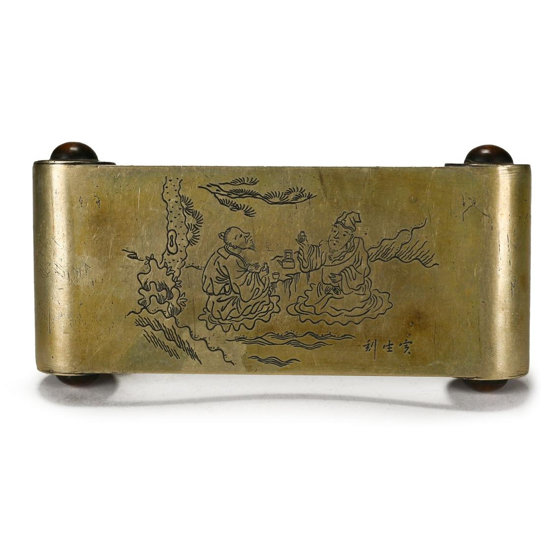 A Chinese Antique Gilt Bronze Decorative Plaque, Qing: A Chinese Antique Gilt Bronze Decorative Plaque.Carved with Chinese scholars in garden view. incised with artist's name. Qianlong Mark on the back, and dated to 1771.Width: 4 1/2 inches.