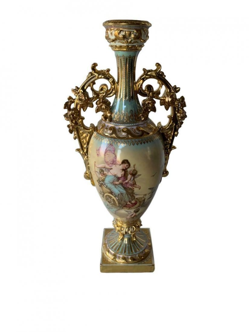 Exceptional Antique Royal Vienna Hand Painted Vase: ANTIQUE ROYAL VIENNA VASE Features a finely hand painted scene depicting Venus, maidens and cupids. Fine scroll leaf gold gilt and bead decoration throughout. 15 3/4 in. high Condition: No Chips and N