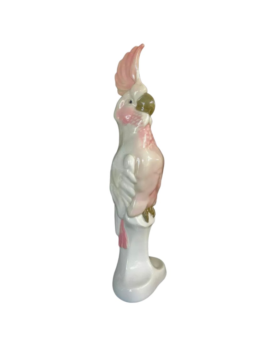 Rare Antique Meissen porcelain cockatoo: Designed in 1908, Antique Meissen porcelain cockatoo, with polychrome painted decoration, the base with a chip to the edge, monogrammed on the reverse, the underside with blue crossed swords mark and 