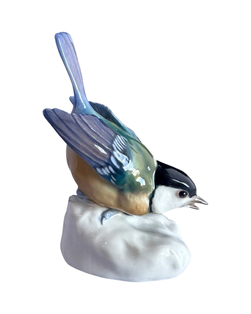 Antique Meissen porcelain bird: A Meissen porcelain pair of birdmodel of a Great Tit, late 19th century, blue crossed swords, incised 1123, impressed 86, 14cm high Condition: Excellent, No Chips and No Cracks throughout Figurine