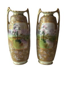 Rare Nippon Green M in wreath Pair of Vases: Rare Nippon Green M in wreath pair of buttress foot vases with a pastoral river landscape with raised gilt decoration. Height 13"Condition: No Chips and No Cracks , Excellent Condition.