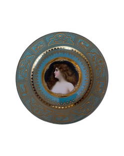 Antique Royal Vienna Porcelain Hand Painted Plate Signed Wagner: ANTIQUE ROYAL VIENNA HAND PAINTED PORTRAIT PLATE Late 19th Century, underglaze Beehive mark and impressed Hutschenreuther maker's markSigned WagnerFinely painted portrait, on a raised gilt detailed