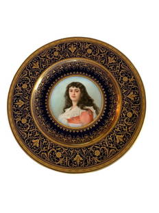 Antique Royal Vienna Porcelain Portrait Hand Painted Plate: Vienna Porcelain Hand Painted Portrait Plate Signed Wagner. Deep blue ground borders and extensive gilt rims of Florentine scrolls and foliate designs. Finely pained portrait of Marie Roland 1754-1793