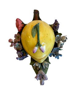 Rare Antique Meissen box in the shape of a pear surrounded by a field of flowers: realistically modeled as a fruit, the upper lid set with fruit on branch handle, Meissen box decorated with modeled flower heads, blue underglaze double crossed swords to underside, 3"h x 6"l x 4"w,