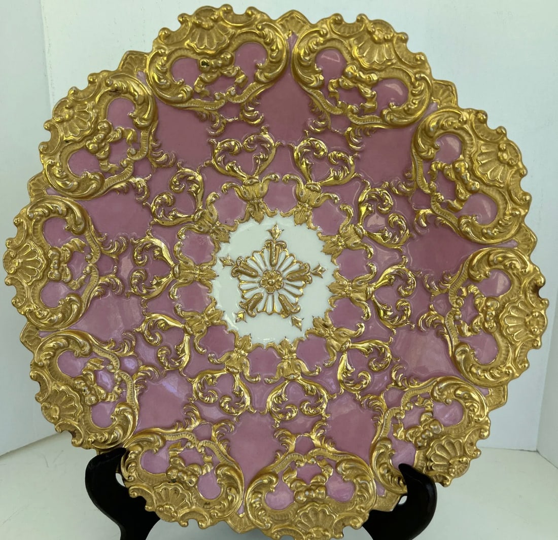 Antique Meissen Porcelain gilded pink charger: Meissen Porcelain charger, late 19th century, 10" diameter. Heavily gilded pink charger.Condition: Excellent Condition, no chips or cracks.