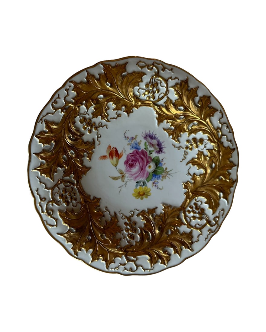 Antique Meissen Porcelain gilded charger: Meissen Porcelain charger, late 19th century, 10" diameter. Heavily gilded charger with hand painted flowers.Condition: Excellent Condition, no chips or cracks.