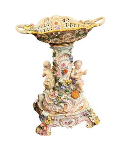 MEISSEN MUSICAL FIGURAL PIERCED BASKET CENTREPIECE: MEISSEN FIGURAL PIERCED BASKET CENTREPIECE 19TH CENTURY underglaze blue crossed swords mark with incised line, gilt painted 2, incised D196 (18 inches high)