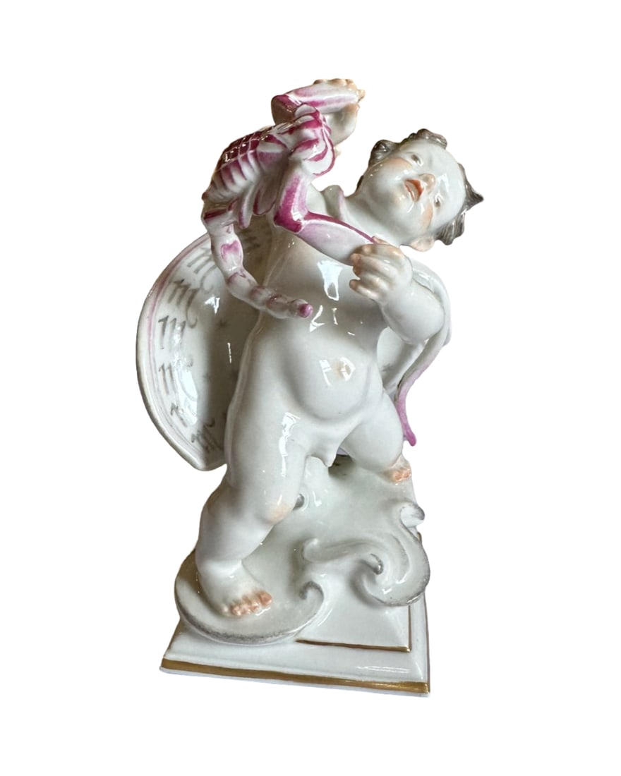MEISSEN PORCELAIN FIGURINE DEPICTING SCORPIO: Meissen porcelain figure depicting on of the Zodiac signs: Scorpio, ca. 1940's. Modeled by "Thein". Maked on the bottom with Meissen swords in blue ink under glaze.Dimensions: H: 5 3/8 in., (13.5 cm.)