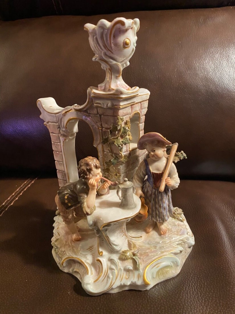 Meissen Figure Gardener Candlestick Children R185: GARDENING CHILDREN WITH CANDLESTICKS meissen,manufactured circa 1900-05 DESIGNED BY AUGUST RINGLER (1899) Height: 18.0 cm Base diameter: 14.0 cm