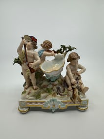 Antique meissen cupid hunting group
