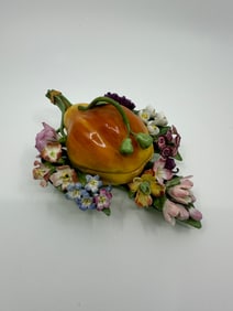 Rare Antique Meissen  box in the shape of a pear surrounded by a field of flowers