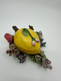 Rare Antique Meissen  box in the shape of a pear surrounded by a field of flowers