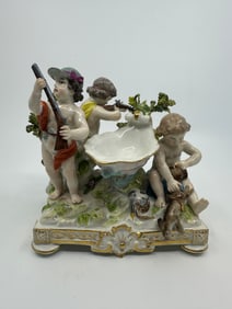 Antique meissen cupid hunting group