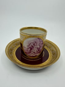 Antique Vienna cup and saucer depicting mythological scene