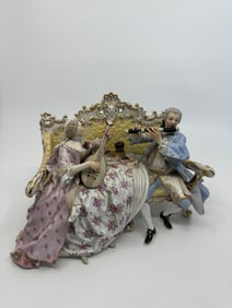 Meissen Crinoline group on sofa Size