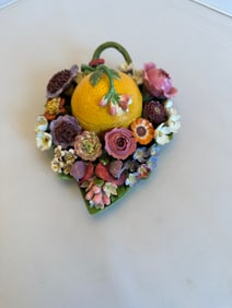 Rare Antique Meissen box in the shape of a lemon surrounded by a field of flowers