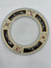 A Meissen porcelain plate in the style of Herculaneum
