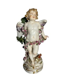 Antique Meissen Cupid bound by roses