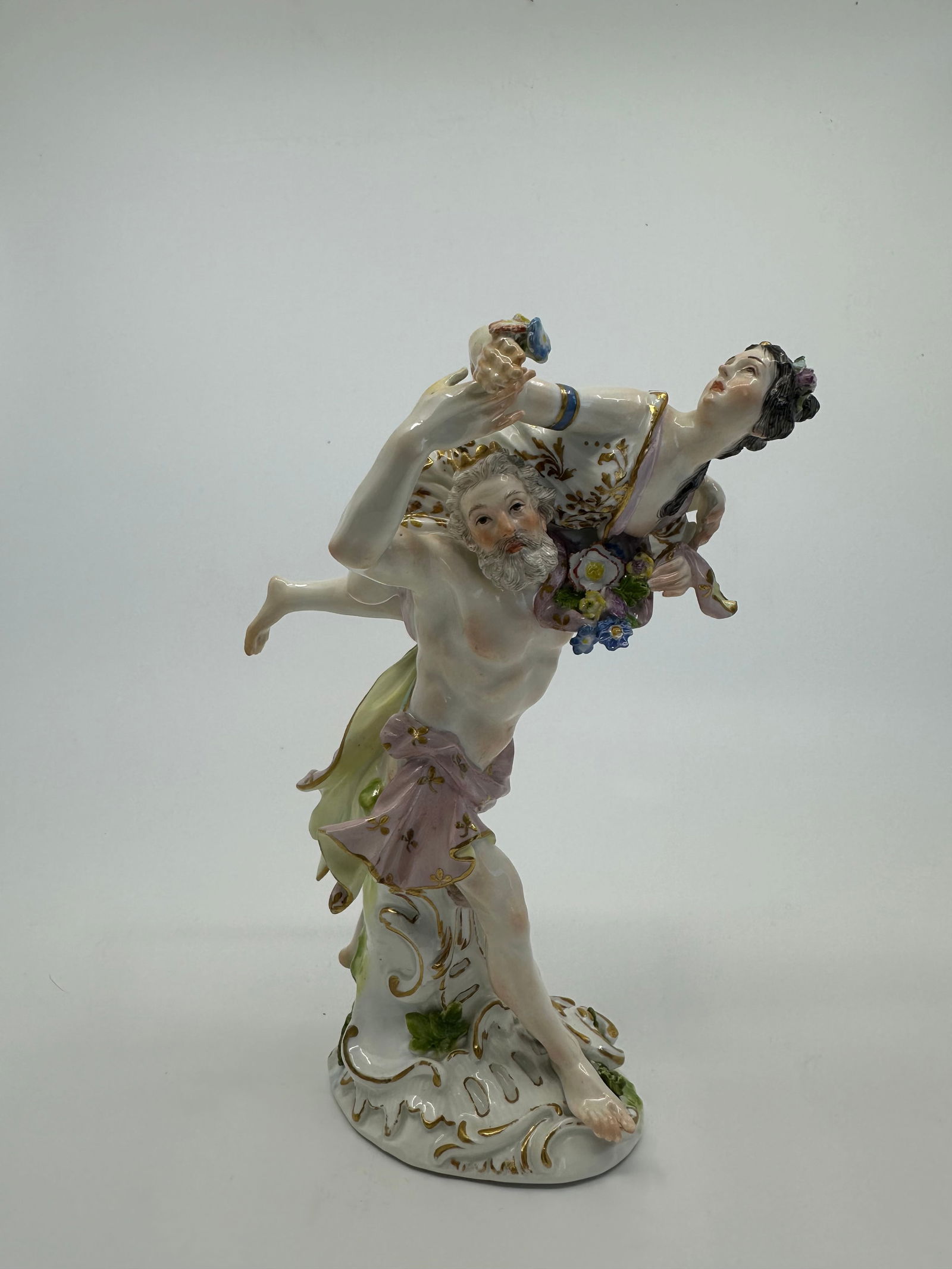 A MEISSEN GROUP 'THE RAPE OF PROSERPINE': A MEISSEN GROUP 'THE RAPE OF PROSERPINE'MID-18TH CENTURY, BLUE CROSSED SWORDS MARK Modelled by J.J. Kaendler, the crowned Hades scantily clad in a flowing robe, striding forward barefoot and carrying