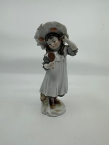 Antique meissen figure of girl with mirror