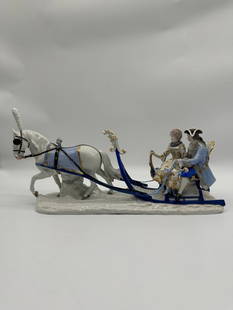 Rare antique Meissen sleigh group: A MEISSEN SLEIGH GROUPLATE 19TH/20TH CENTURY, BLUE CROSSED SWORDS MARK, INCISED D 238., IMPRESSED 127, IRON-RED 62.Modeled as an amorous couple seated in sleigh drawn by a white horse wearing blinders