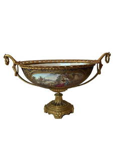 Antique Sevres Porcelain Bronze Centerpiece: AN ORMOLU-MOUNTED SEVRES COBALT-BLUE GROUND CENTERPIECE LATE 19TH CENTURY, INTERLACED L'S MARK THE PIERCED SCROLLWORK GALLERY FLANKED BY UPRIGHT SCROLLING BULRUSH HANDLES, SIGNEDTHE FRONT PAINTED AFTE