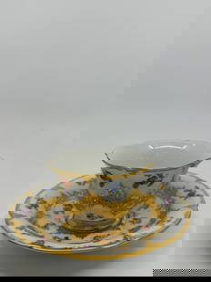 Antique Meissen B Form Strewn Flowers Gold Gilt Tea Cup & Saucer Set: Fine antique Meissen porcelain tea cup and saucer plate set, gold decorated with embossed ornaments of floral motifs. In the middle assorted bouquets of multicolored flowers. This Meissen saucer and c