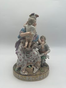 A MEISSEN FIGURE GROUP OF THE YOUNG MOTHER