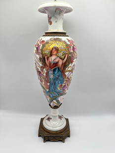 Antique Sevres Art Nouveau Vase: A FRENCH ART NOUVEAU PORCELAIN VASE circa 1910Marks: S (in blue underglaze), FRANCE (stamped to mount)22 inches high The vase with painted sinuous floral decoration on a lustre ground, portrait of a w