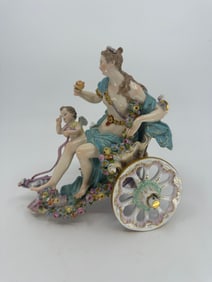A Meissen porcelain Venus and Cupid carriage group