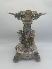A MEISSEN RETICULATED CENTERPIECE AND A STAND
