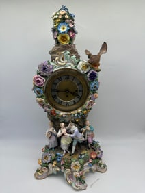 A MEISSEN PORCELAIN FLOWER-ENCRUSTED FIGURAL CLOCK