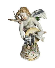 Antique Meissen cupid with doves
