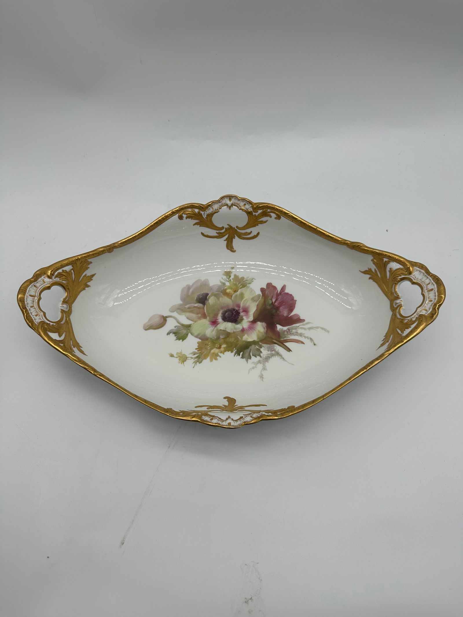 Antique Large KPM bowl flowers: Beautiful KPM Berlin Large bowl with gorgeous hand painted anemone flowers.The bowl is in excellent antique condition with no chips, cracks or repairs. The interior of the bowl is pristine. Circa 1880