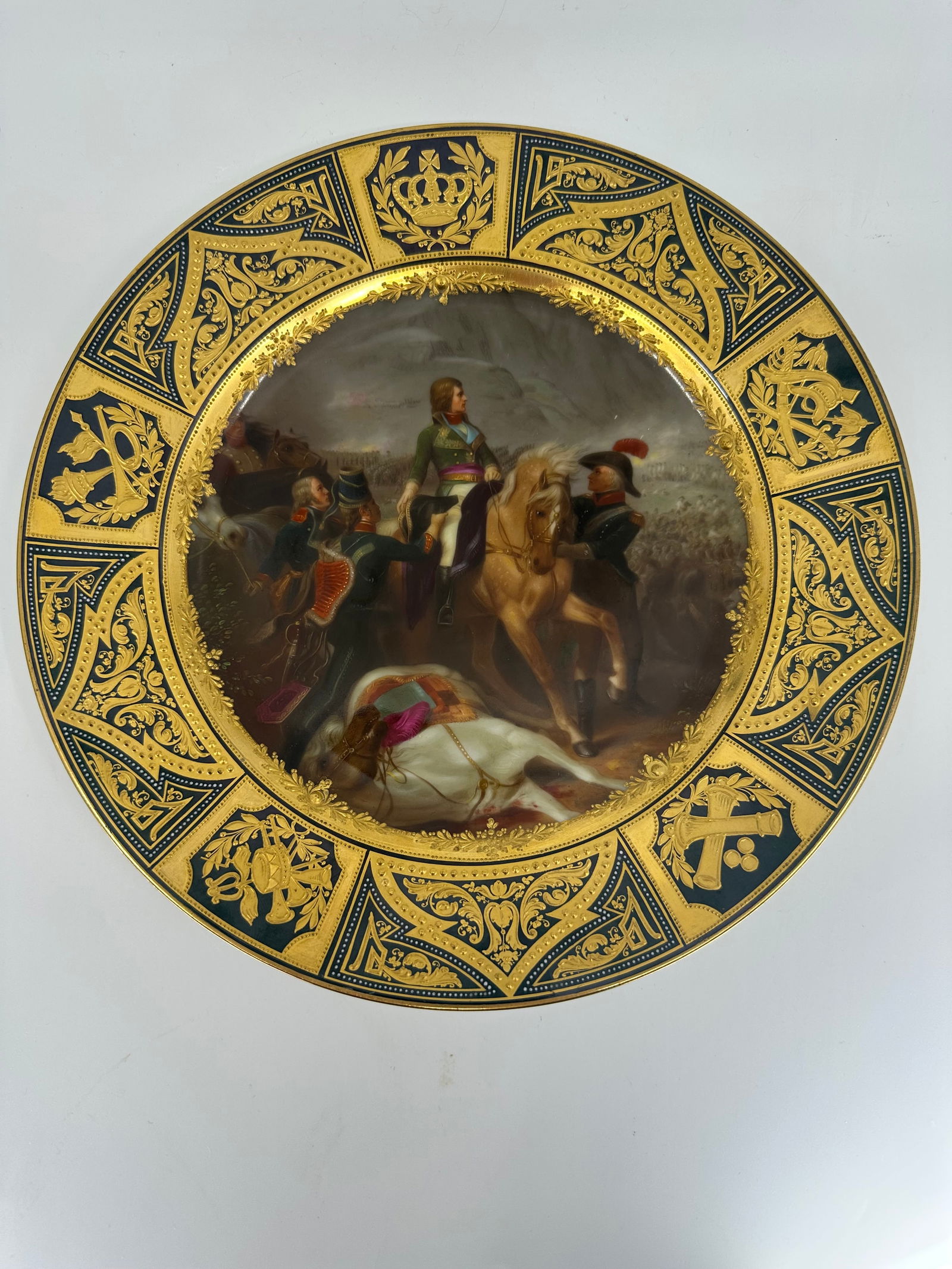 ANTIQUE ROYAL VIENNA HAND PAINTED NAPOLEON PLATE: ANTIQUE ROYAL VIENNA HAND PAINTED NAPOLEON PLATE Late 19th Century, underglaze Beehive mark and impressed Hutschenreuther maker's mark, hand-painted battle scene titled "Schlacht bei Rivoli," depictin