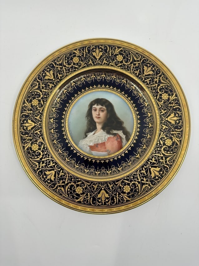 Antique Royal Vienna Porcelain Portrait Hand Painted Plate: Vienna Porcelain Hand Painted Portrait Plate Signed Wagner. Deep blue ground borders and extensive gilt rims of Florentine scrolls and foliate designs. Finely pained portrait of Marie Roland 1754-1793