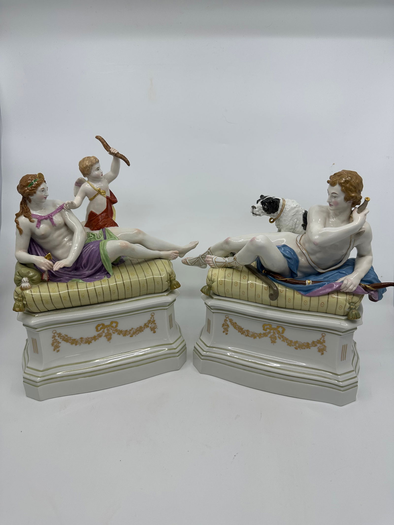 Antique KPM mythological pair of figural groups: KPM Berlin, Early 20th century, 1st choice, red imperial mark, Figures modelled as Diana and Apollo, verso marked, gilded, 9 3/4" H by 9" W Excellent condition, no chips or cracks.