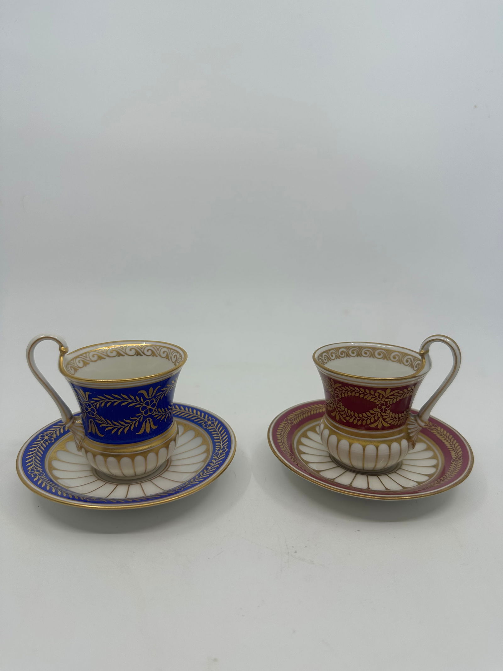 Antique pair of KPM mocha cup and saucer: Pair of KPM Porcelain mocha cup and saucer KPM Berlin hand painting Height of cup without 5.5 cm Width 5.5cmDiameter of saucer 10 cm Good condition with no signs of wear