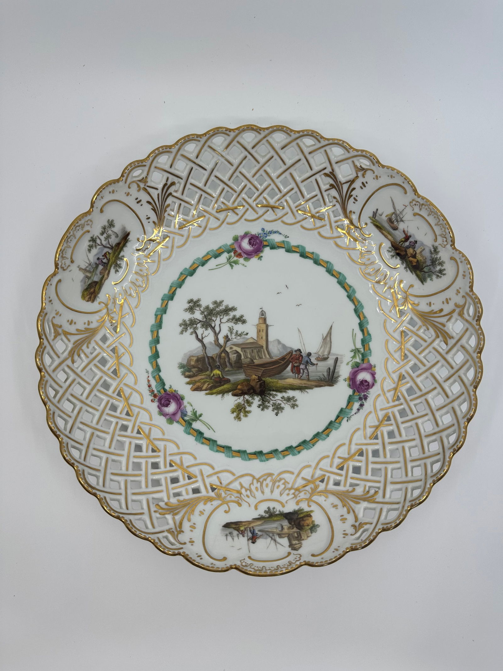 ANTIQUE MEISSEN PORCELAIN RETICULATED CABINET PLATE: ANTIQUE MEISSEN PORCELAIN RETICULATED CABINET PLATE. LATE 19TH CENTURY, BLUE CROSSED SWORDS MARKS, VARIOUS IMPRESSED NUMERALS. Finely painted Harbor scene 10 1/2 in. diameter Condition Excellent condi