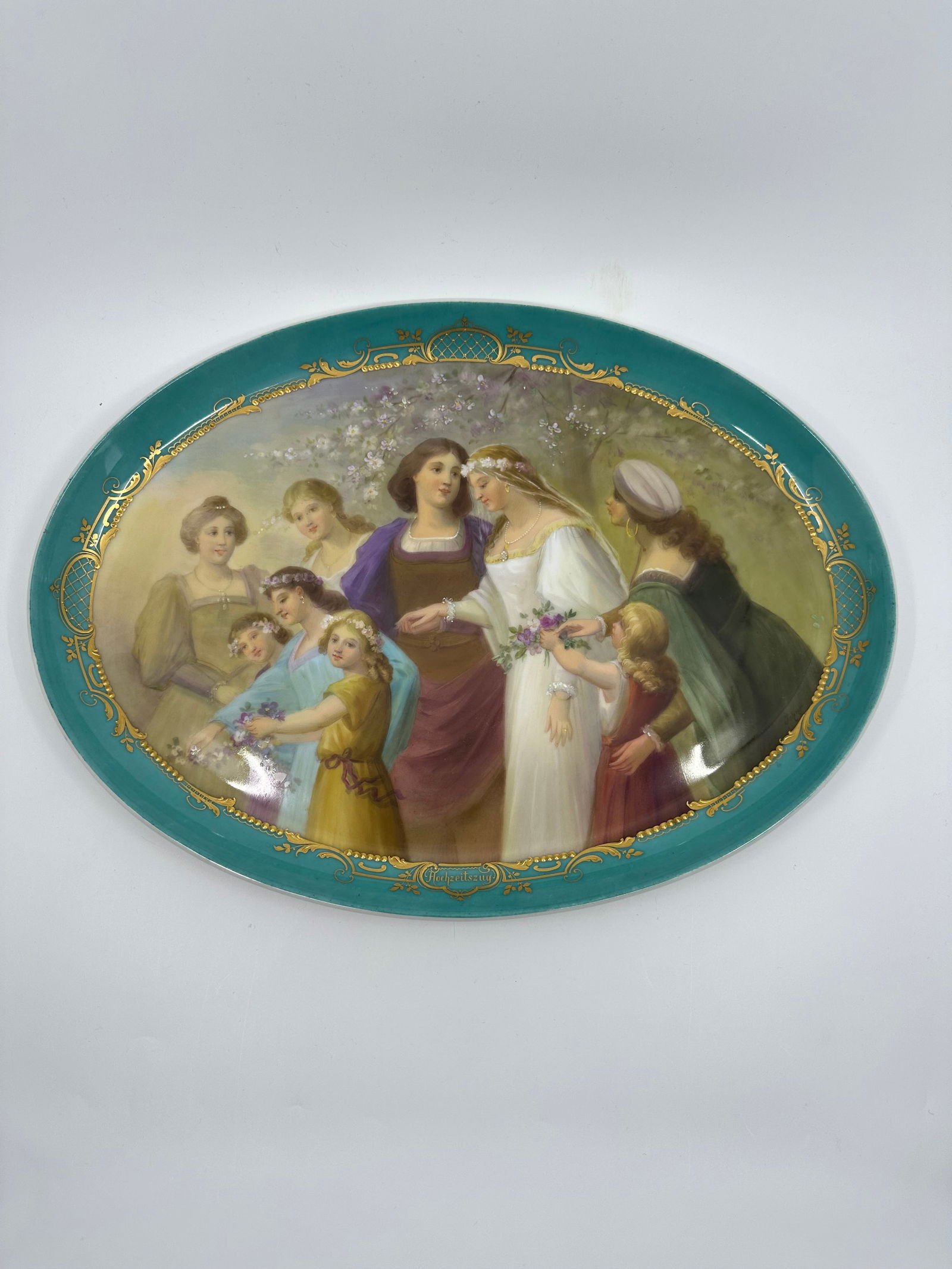 Stunning Antique Royal Vienna Porcelain Charger: A Royal Vienna Painted Porcelain Tray,the shaped, dished tray decorated with maidens in a landscape, signed lower right Johner, the verso titled "Hochzeitszug" with blue shield mark, also impressed TK