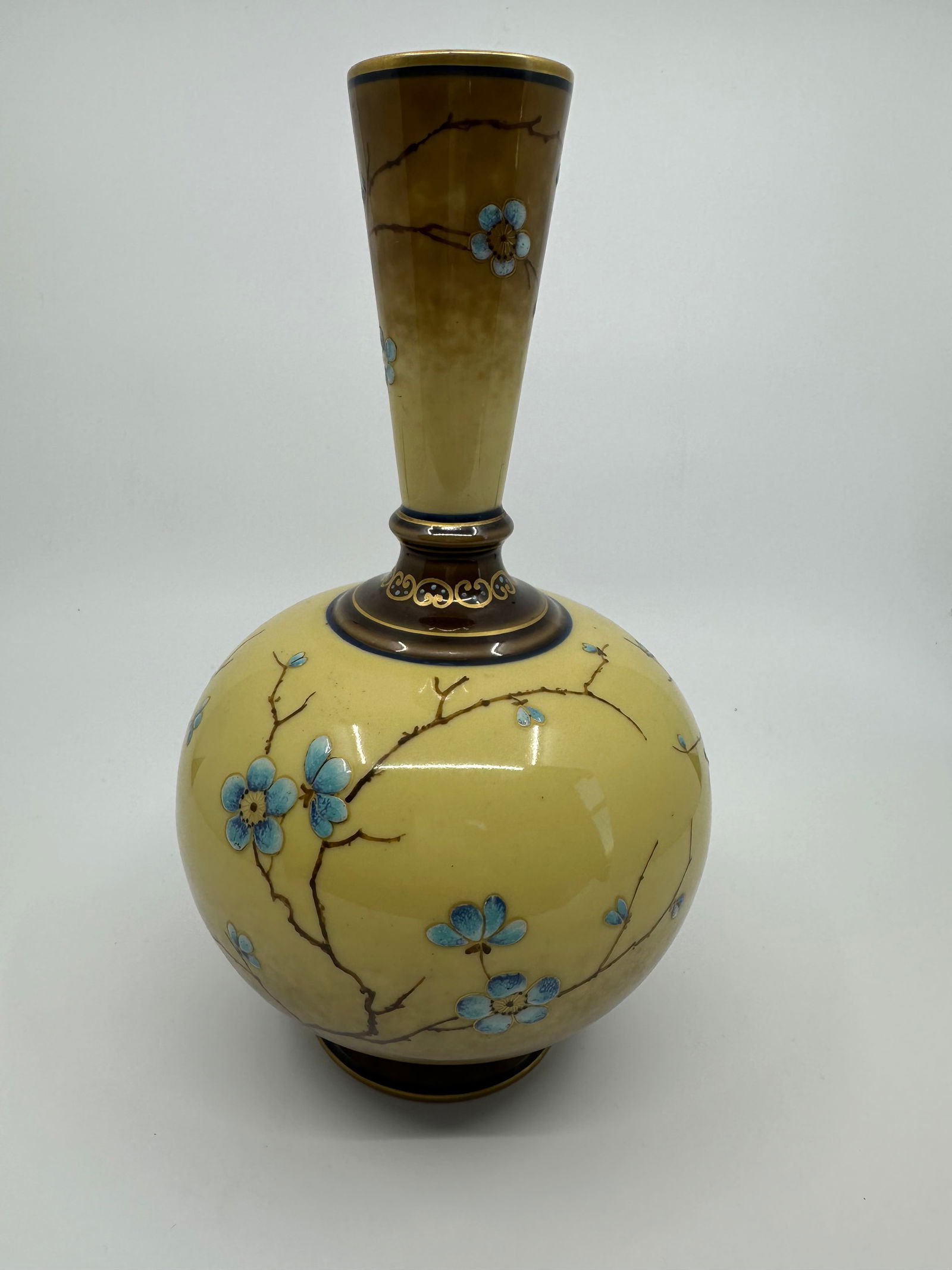 ANTIQUE KPM VASE CHERRY BLOSSOM SEGER: Decorated KPM Berlin features a stunning tortoiseshell glaze and delicate enamel flowers in celeste blue. Blue sceptre mark, impressed marks. H 9.5 in. Excellent Condition, no chips or cracks