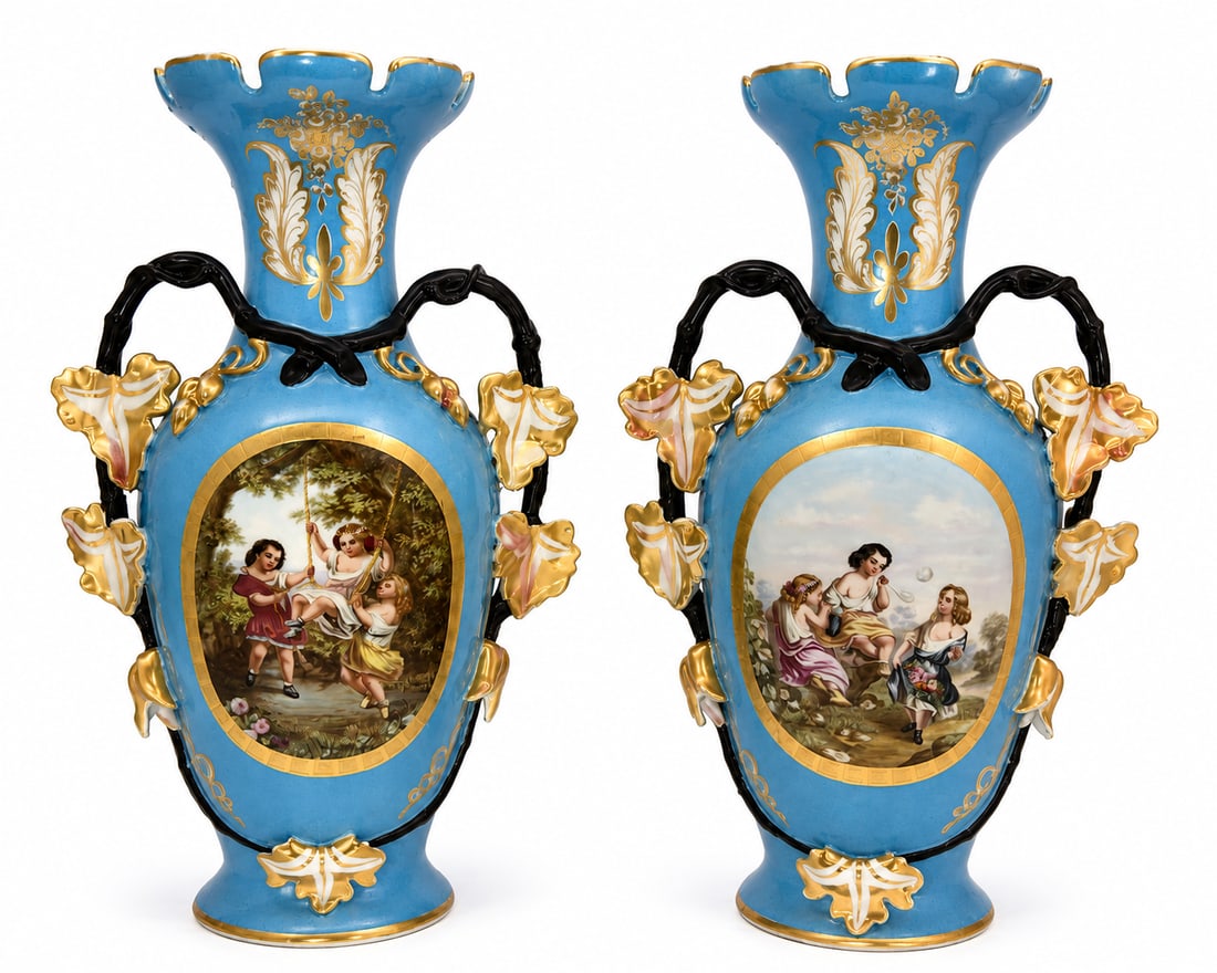 Beautiful Antique Pair of Old Paris Sevres Style Vases: A Pair of Monumental Vieux Paris Polychrome and Gilt Porcelain Vases c. 1860, of baluster shape with flared crenellated rims, applied vine-and-leaf handles, the large reserves finely painted with scen