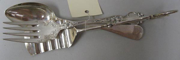 Three Flatware Serving Pieces: an English silverplate asparagus server; a Wallace Silversmiths sterling meat fork in the "Violet" pattern; and a soup or tablespoon with blurred hallmarks and the name J. Petry.