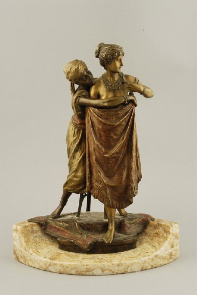A Vienna Bronze Figure of a servant girl draping h
