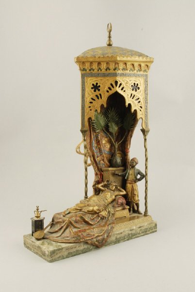 A Vienna Bronze Lamp, of a lady reclining in her h