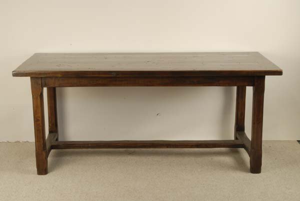An Early French Farm Table of cherry, with breadbo